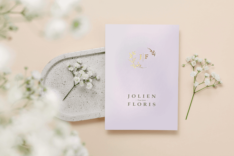 Festive%20paper%20greeting%20card%20on%20ceramic%20tray%20and%20gentle%20gypsophila%20flowers%20on%20beige%20background%2C%20top%20view.%20Mockup%20paper%20card%20for%20design%2C%20print%2C%20wedding%20and%20invitation