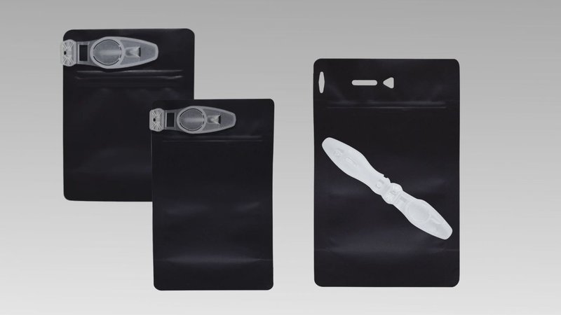 Custom%20hemp%20packaging%20pouches%20with%20child-resistant%20closures%20displayed%20against%20a%20neutral%20background.